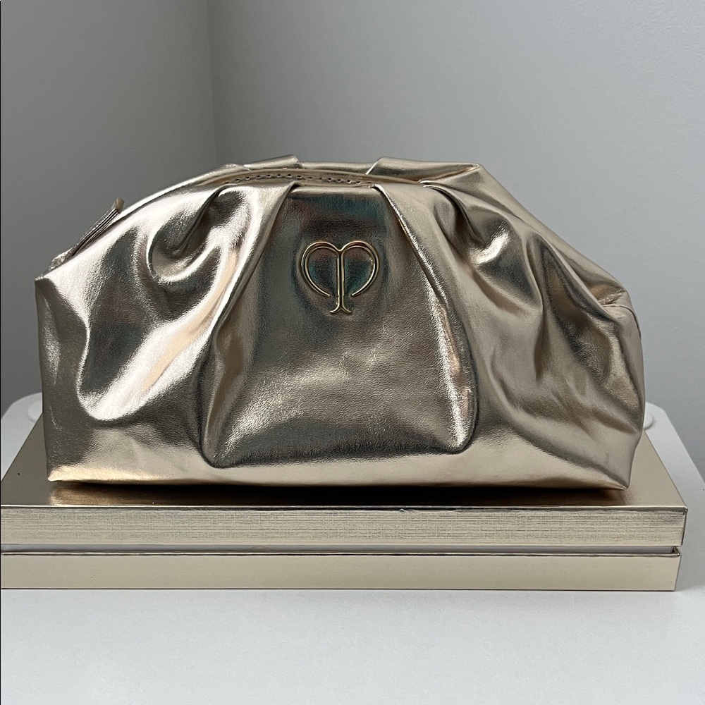 Clé de Peau Beauté Gold makeup cosmetic Bag